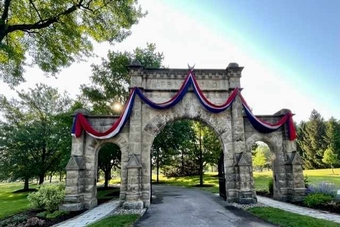 The arch with bunting at sunrise