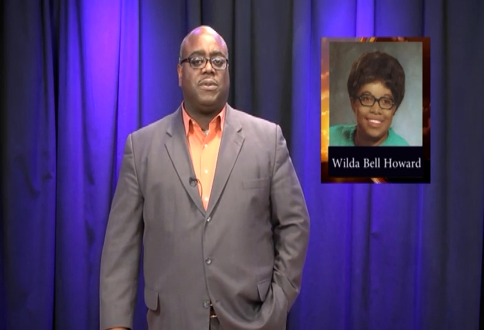 Rev Carter with image of Wilda Bell