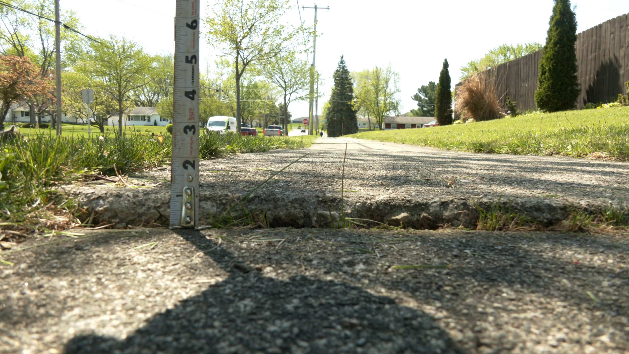 Measuring of sidewalk height